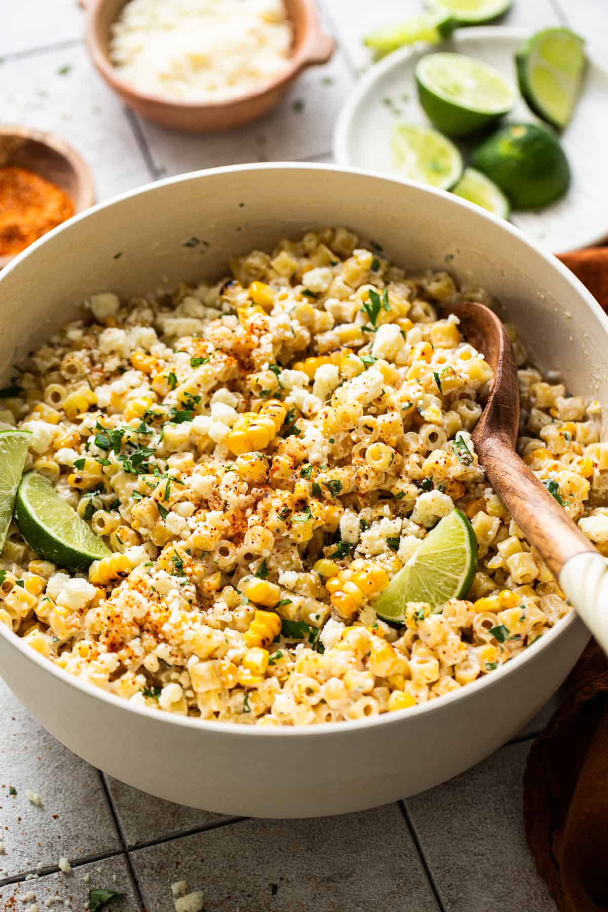 female foodie mexican street corn pasta salad